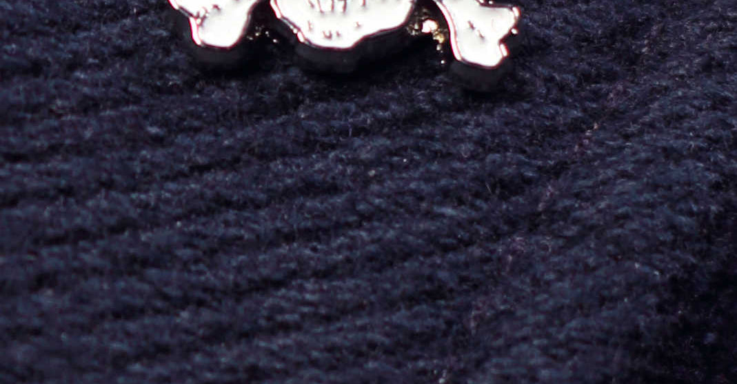 White skull enamel lapel pin