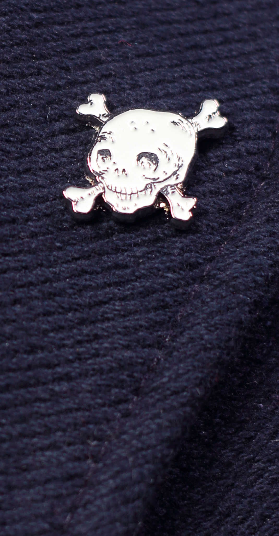 White skull enamel lapel pin