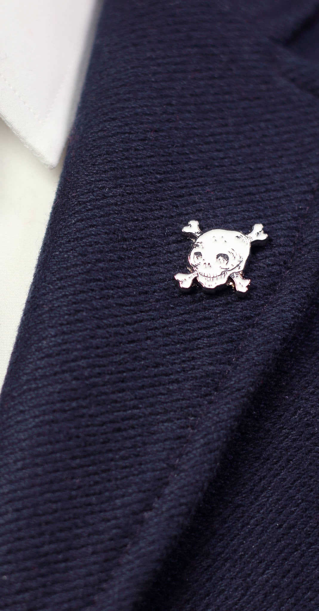 White skull enamel lapel pin